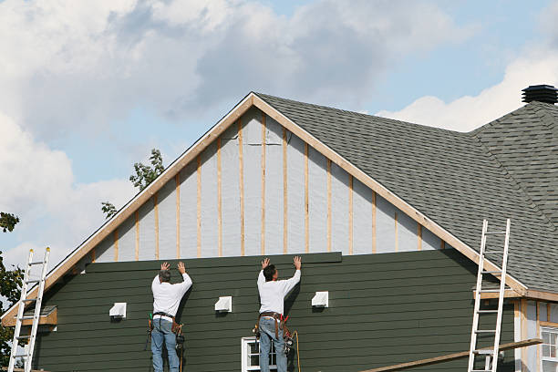Professional Vinyl Siding technician working in Roaring Spring, PA
